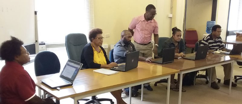 CAPTION: Participants in Papua New Guinea learning how to use video conferencing tools ahead of a Digital Transformation Centre training. Photo credit: ITU